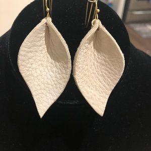 Ivory leather earrings.